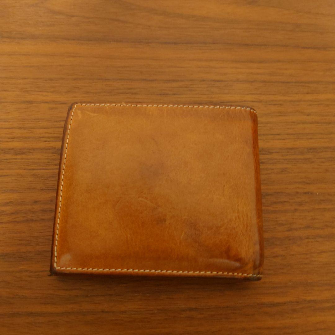 新品未使用,定価49,500円,変色前ヌメ革【イルビゾンテ】折り財布② org.jpg