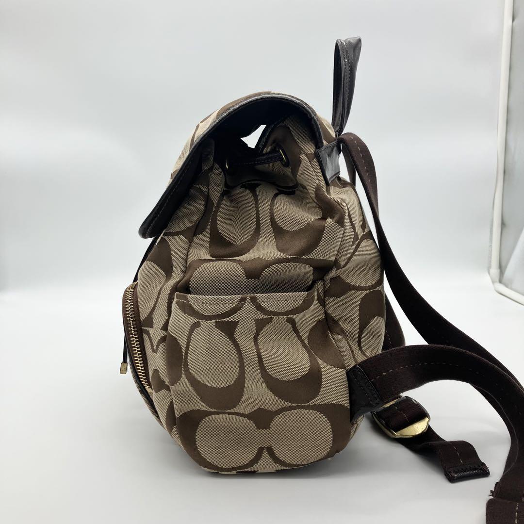 COACH リュック ブラウン ベージュ　シグネチャー 巾着型 F21928