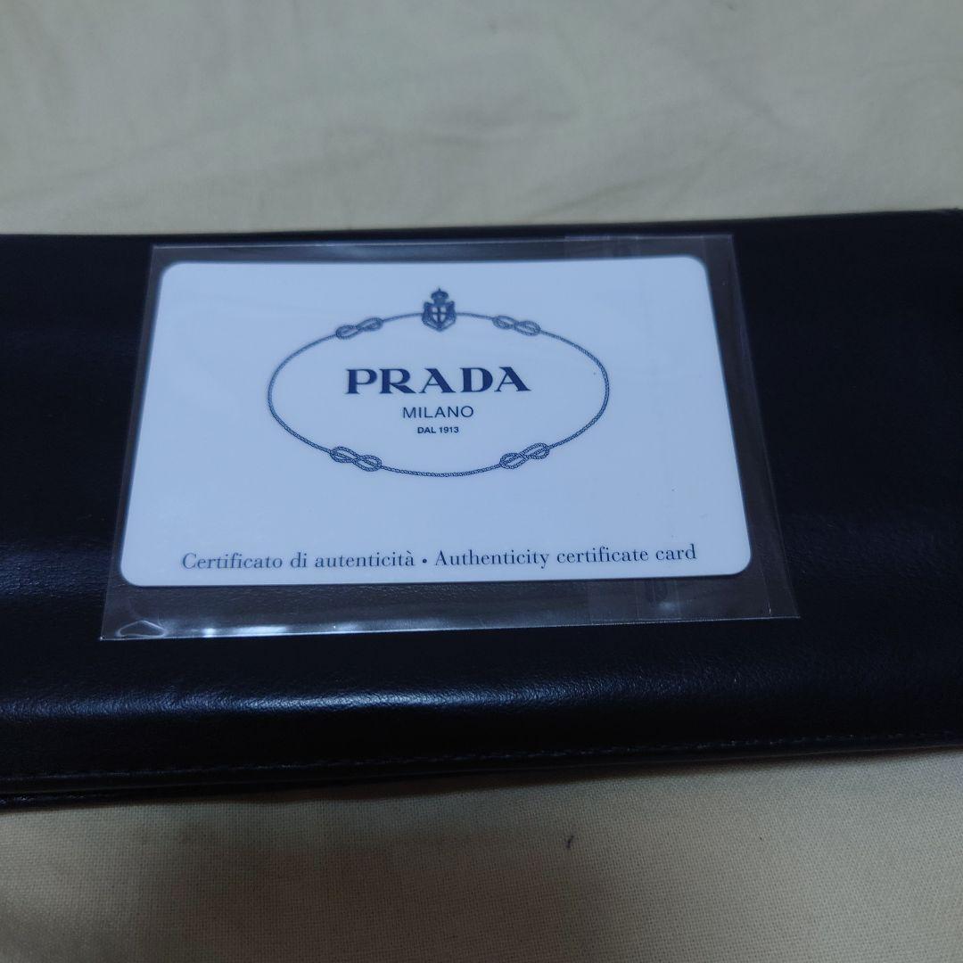 PRADA ブラック 二つ折り財布 認証カード付き 中古使用品 - メルカリ
