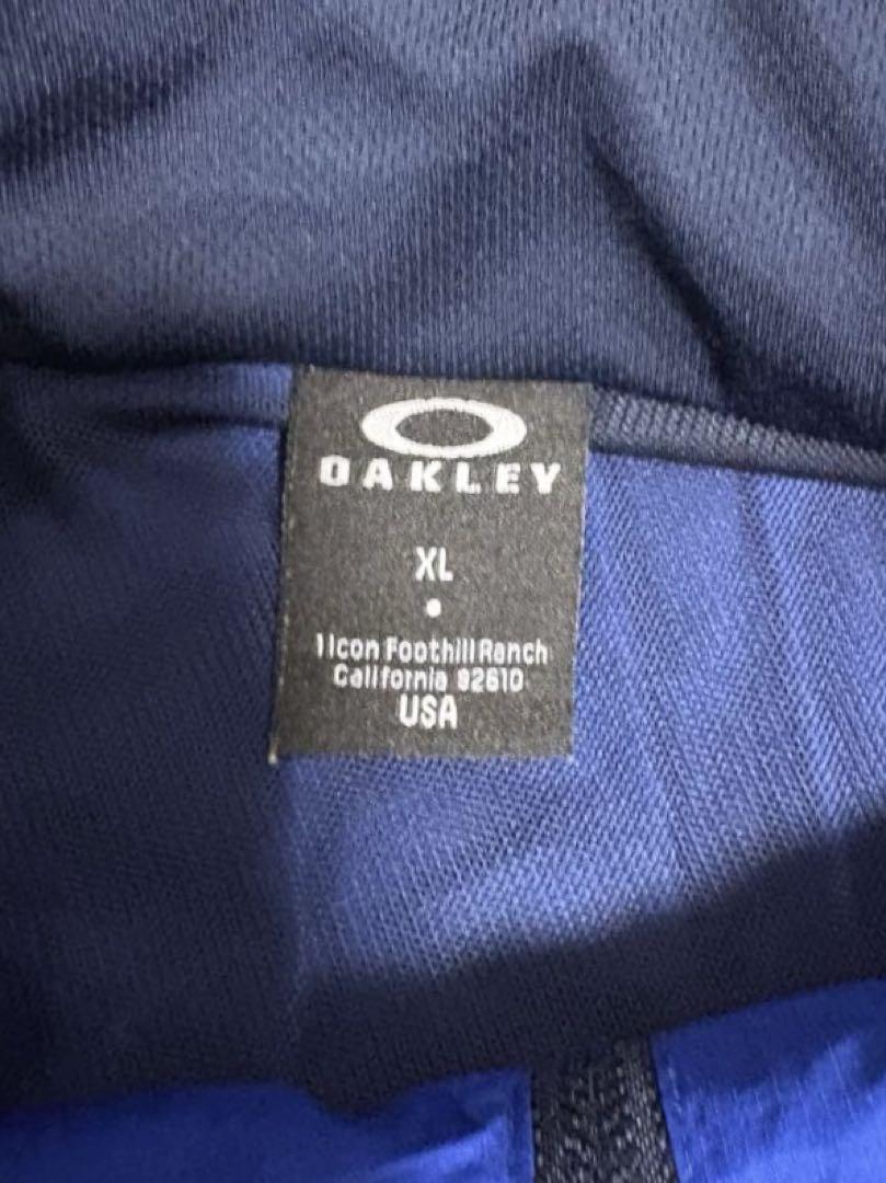 美品【Oakley 】ウィンドブレーカー XL 青/黒
