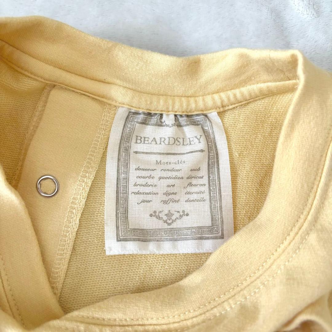 BEARDSLEY 後パールドットボタンカットソー イエロー ビアズリー 長袖 トップス BEARDSLEY 後パールドットボタンカットソー イエロー ビアズリー 長袖 トップス