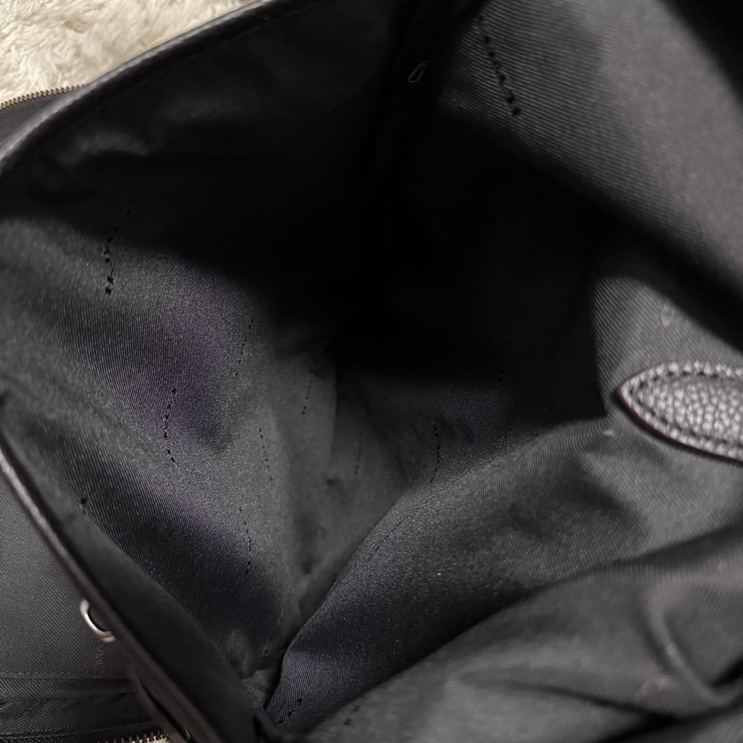 コーチ メトロポリタン ソフトバックパック ロゴ型押し レザー 黒 A4可