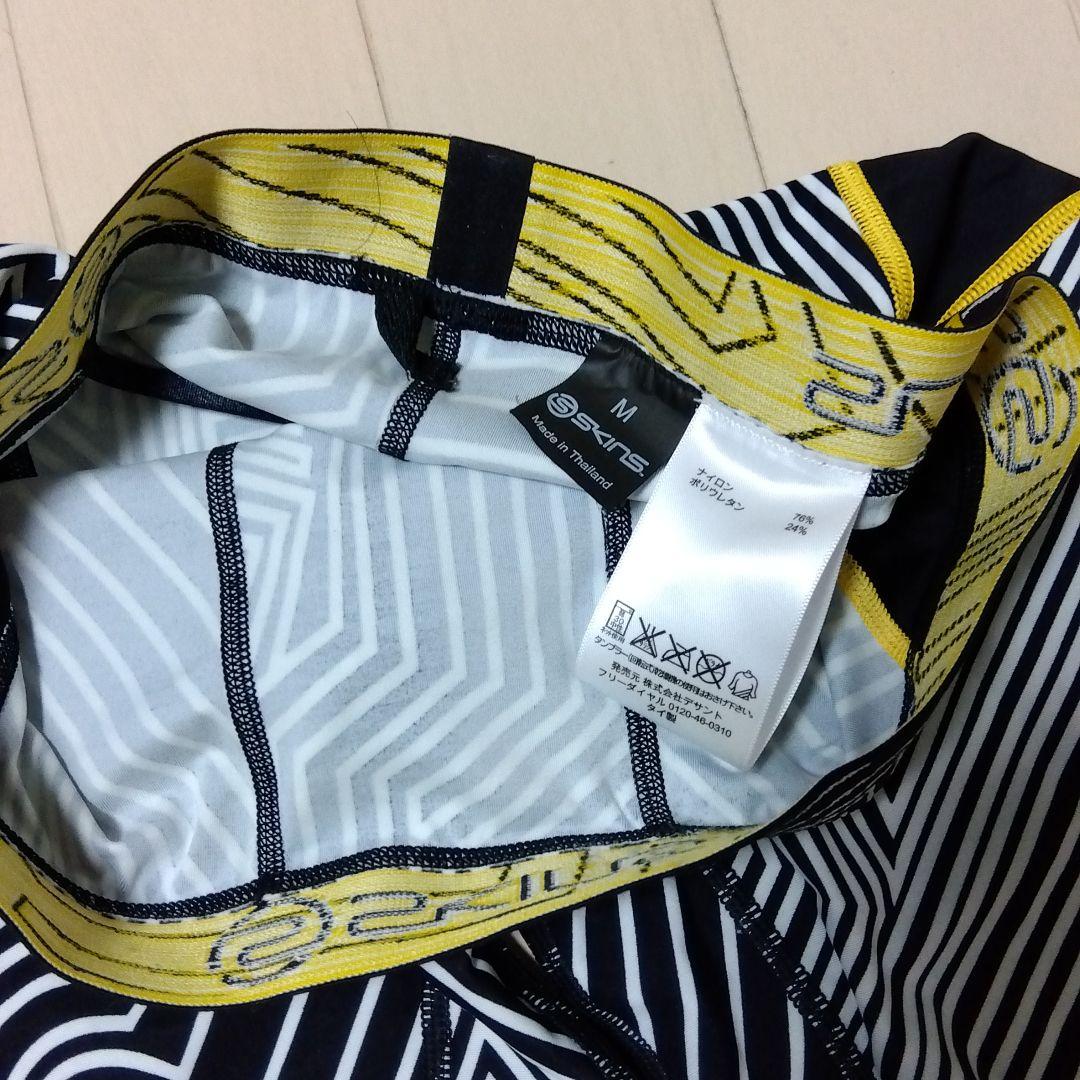 スキンズ 上下セット新品(L・M)