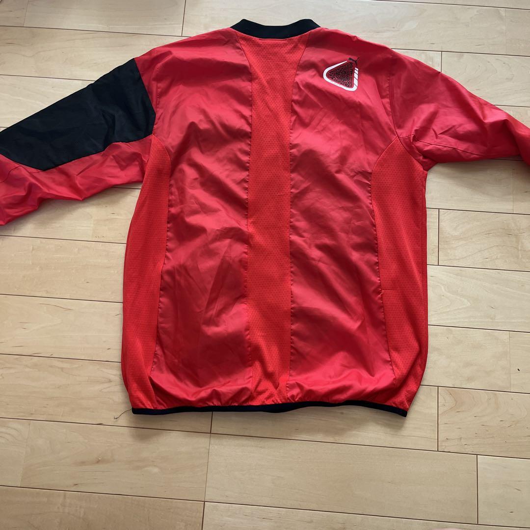 PUMA ウィンドブレーカー Lサイズ ブラック/レッド Puma ピステ・ウィンドブレーカー レッド/ブラック - メルカリ