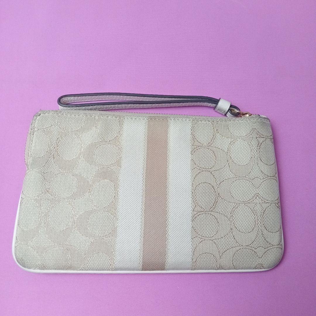 COACH ポーチ シグネチャージャカード ストライプパッチ付き