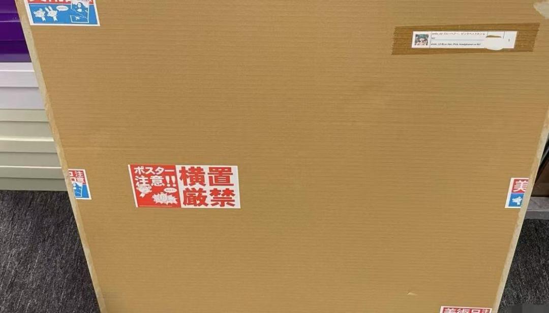 村上隆とmebaeのコラボレーションによる限定版画「微笑みの女の子」ED100