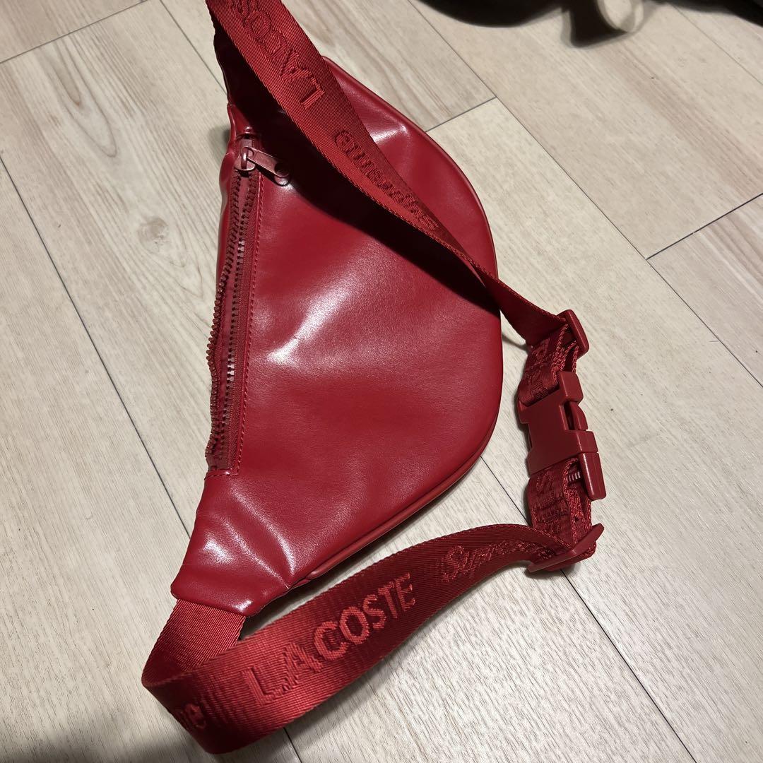 LACOSTE SUPREME レッド ボディバッグ