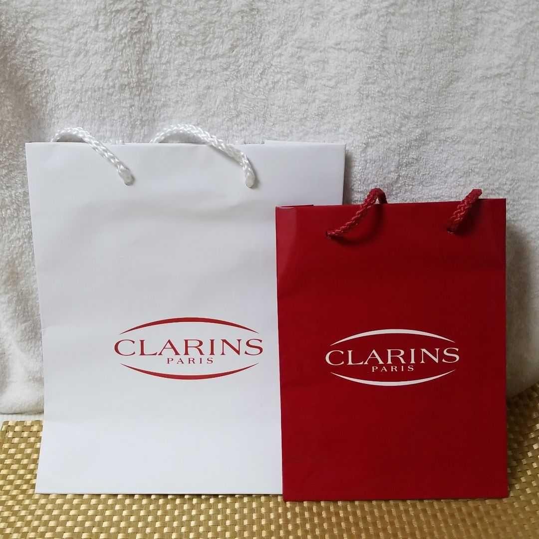Clarins クラランス ブランドショップ紙袋 白 赤 大小サイズ2枚セット メルカリ