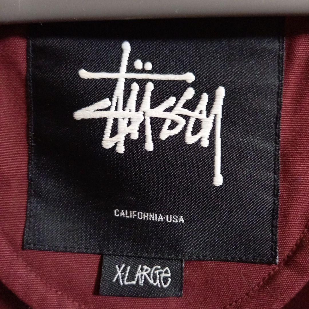 Stüssy ブラック フード付きパーカー