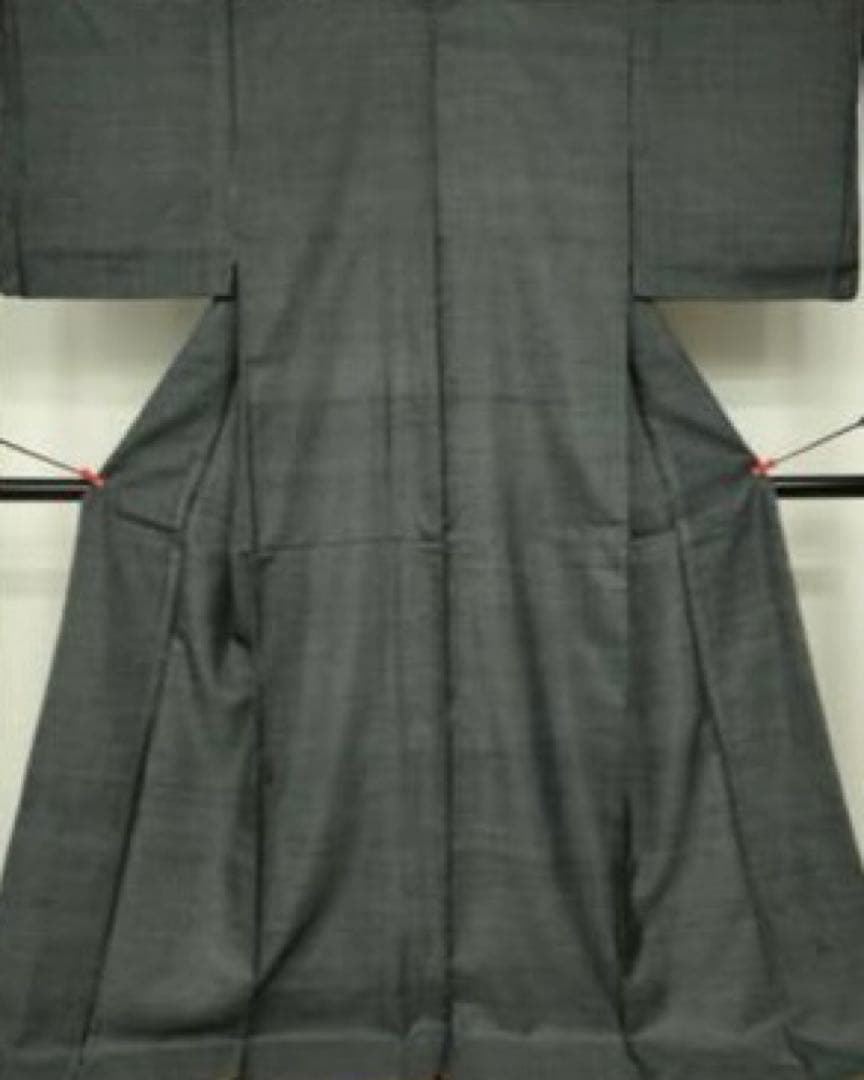 モデルサイズ上質細糸で織られたしつけ糸付大島紬袋帯　切嵌人物風景文正絹　未使用