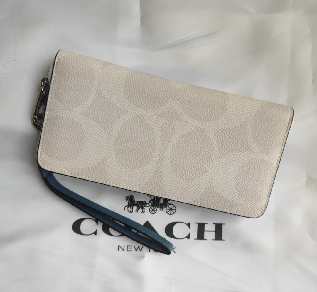 COACH - COACH コーチ 長財布 エンボス シグネチャー 白 の通販