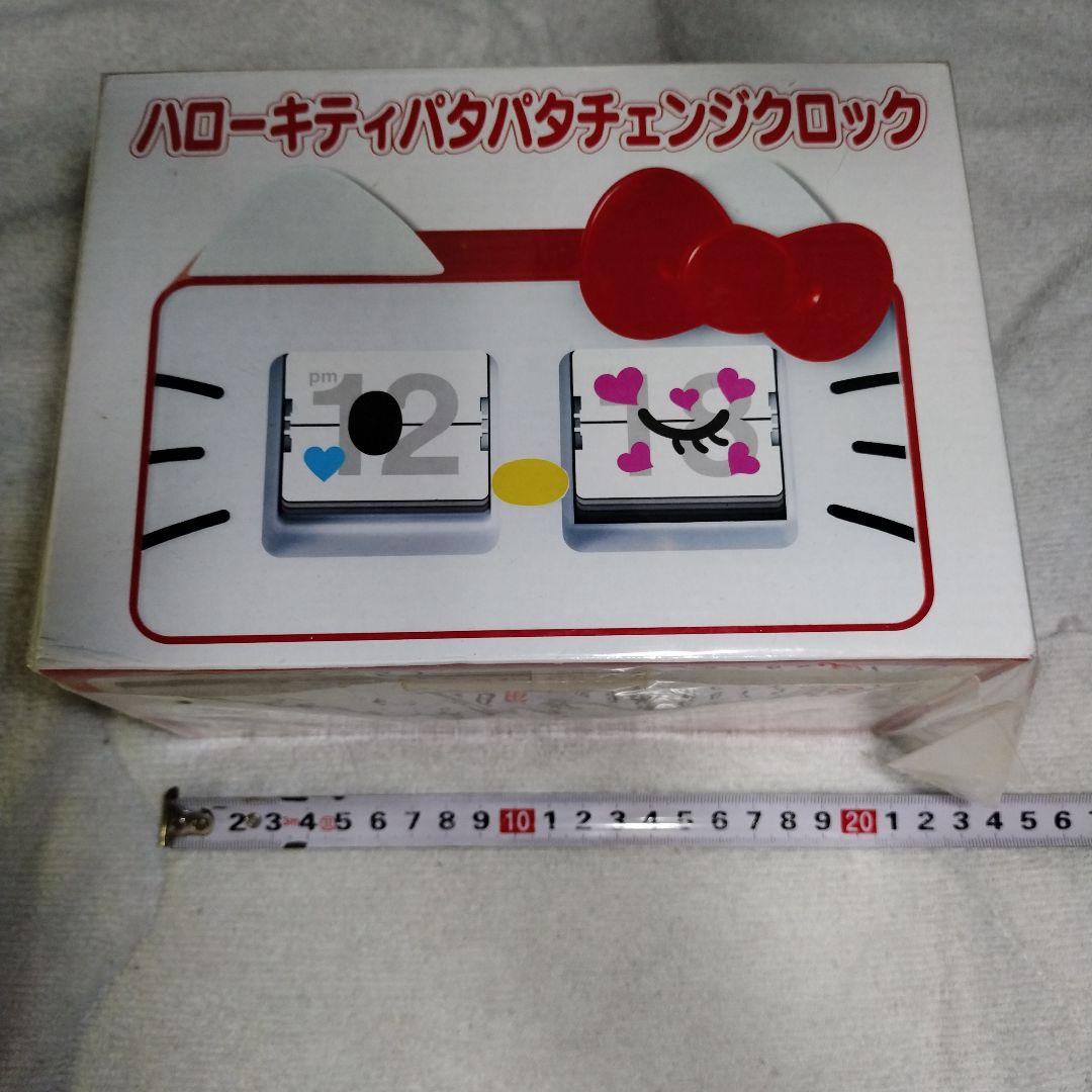 大人気の ハローキティパタパタチェンジクロック - メルカリ インテリア時計
