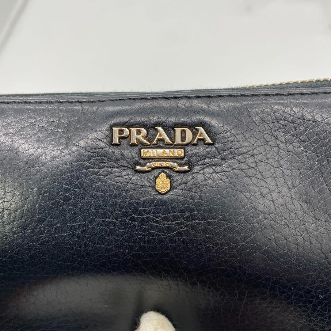 PRADA プラダ レザー ブラック 黒 ラウンドジップ 財布 箱付き