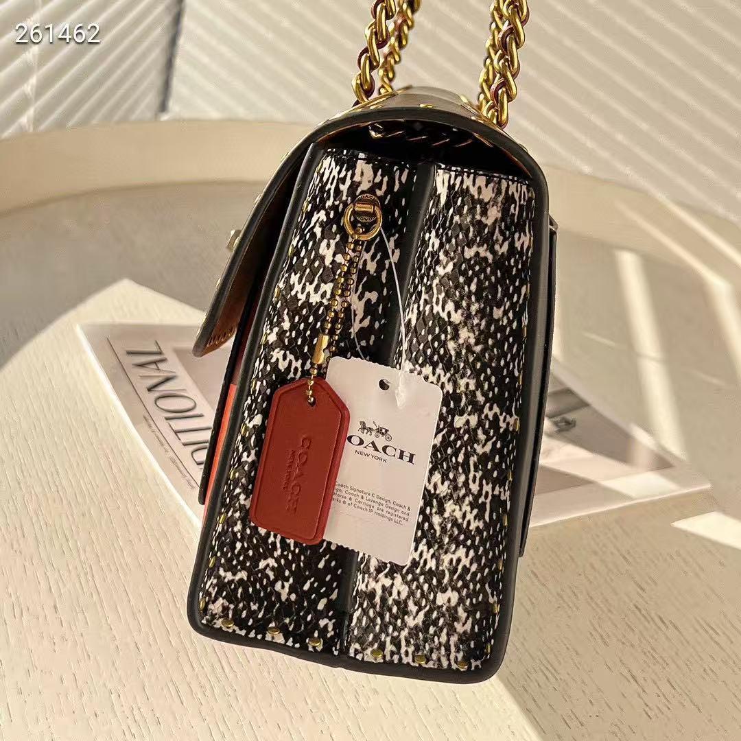 coach スタッズ付きオレンジ黒ショルダーバッグ coach スタッズ付きオレンジ黒ショルダーバッグ