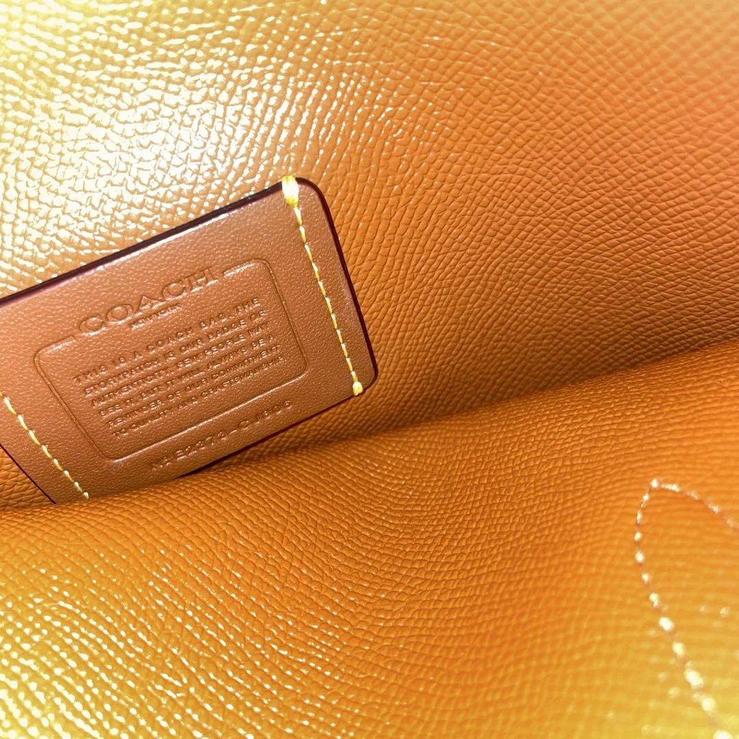 Coach カーター オレンジ ブラウンレザー ミニトートバッグ