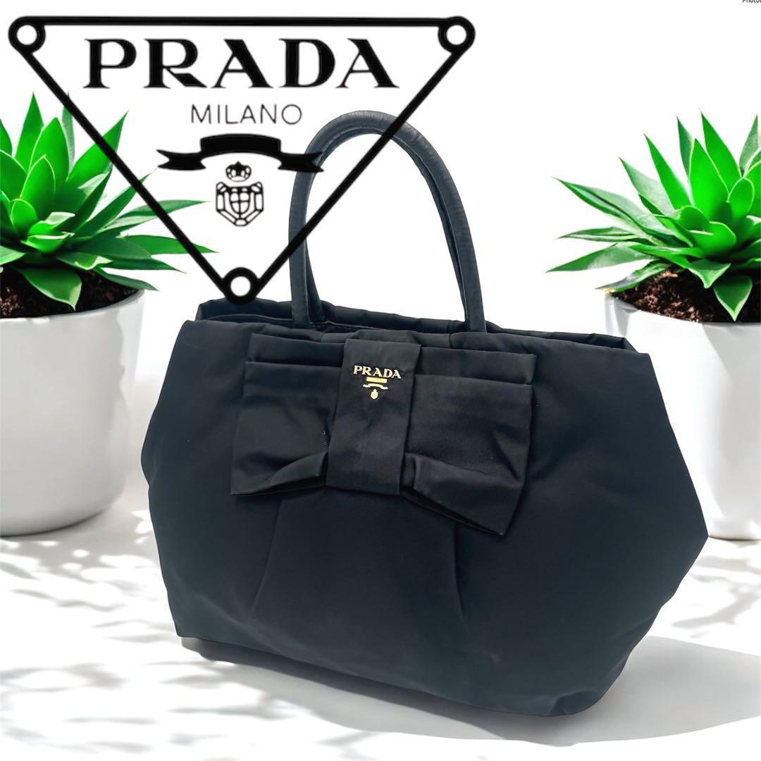 【人気】PRADA プラダ ハンドバッグ リボンモチーフ 黒 ナイロン タグ有り