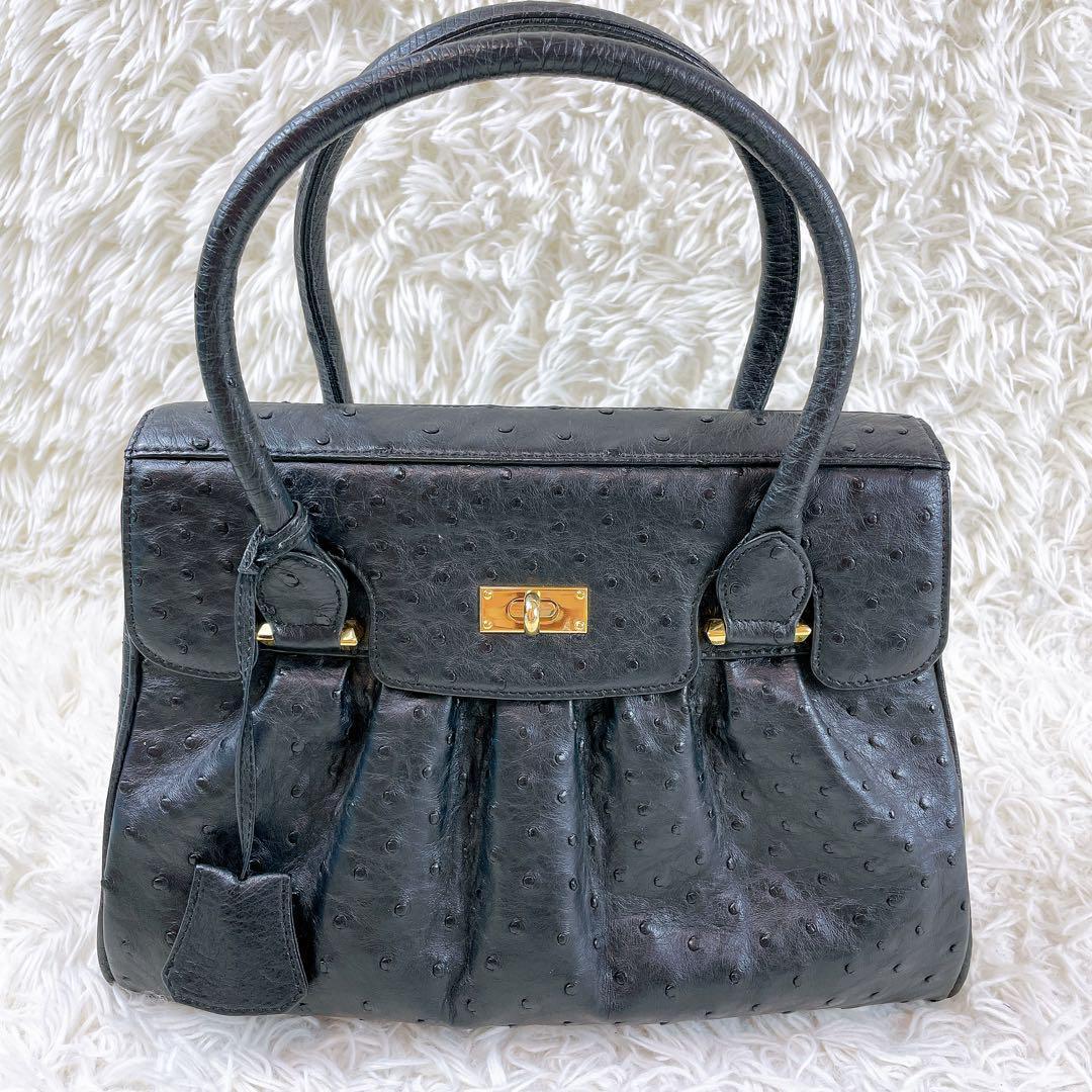 安心のメルカリ便❤️ハンドバック オーストリッチ 金具 金 本革 ZAO オーストリッチ ハンドバッグ 本革 トートバッグ 南京錠 黒