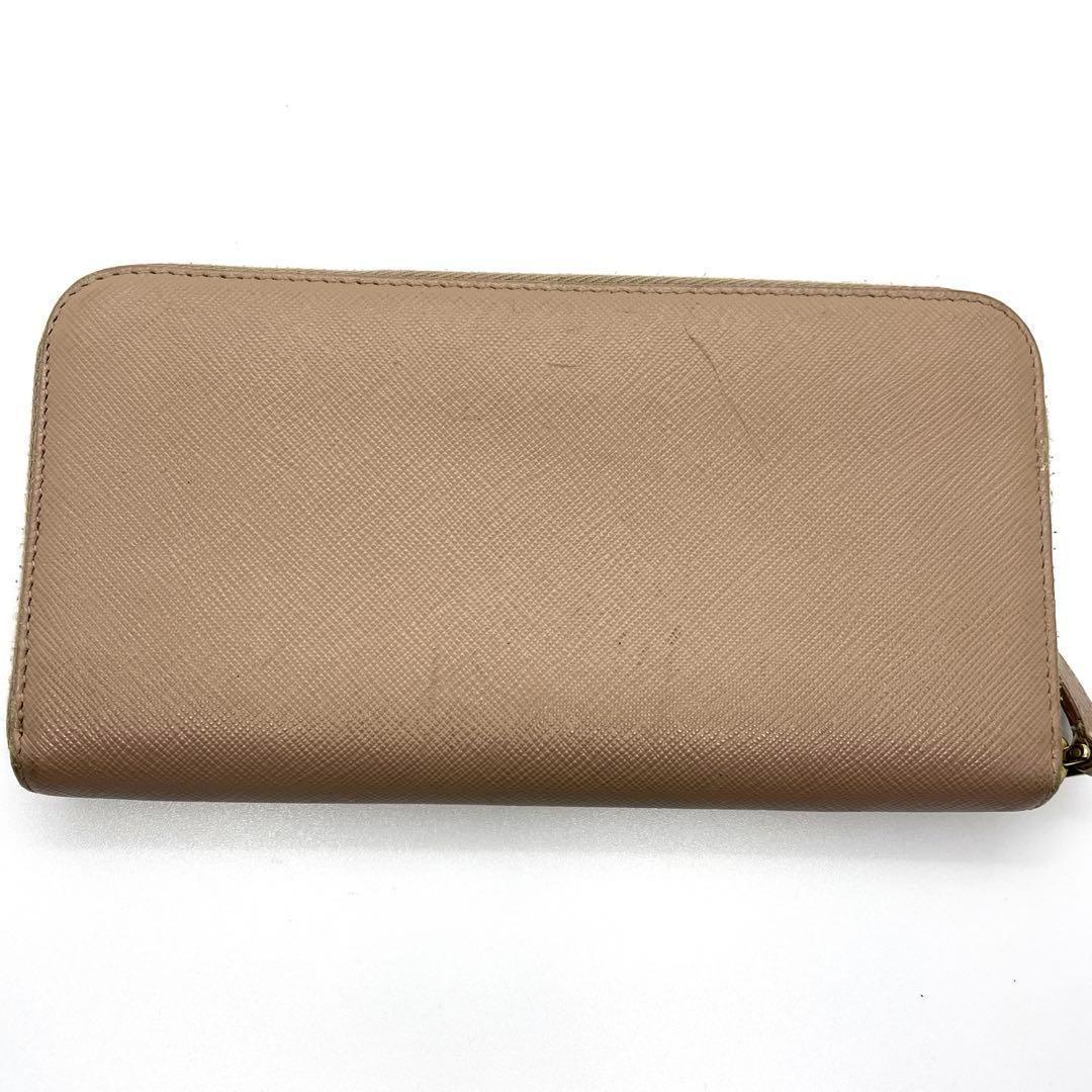美品 プラダ 長財布 ラウンドジップ サフィアーノレザー ピンクベージュ 美品 プラダ 長財布 ラウンドジップ サフィアーノレザー ピンク