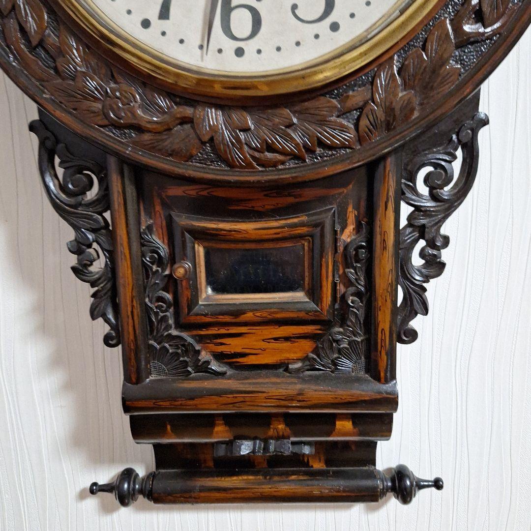 彫刻装飾の木製壁掛け時計傷や汚れあり