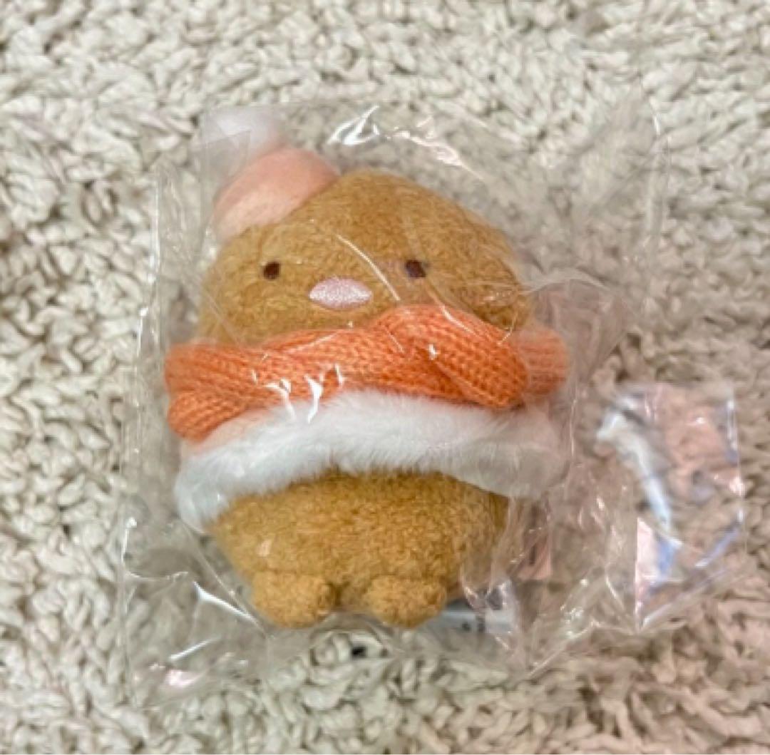 オレンジ色のぬいぐるみ 帽子・マフラー付き