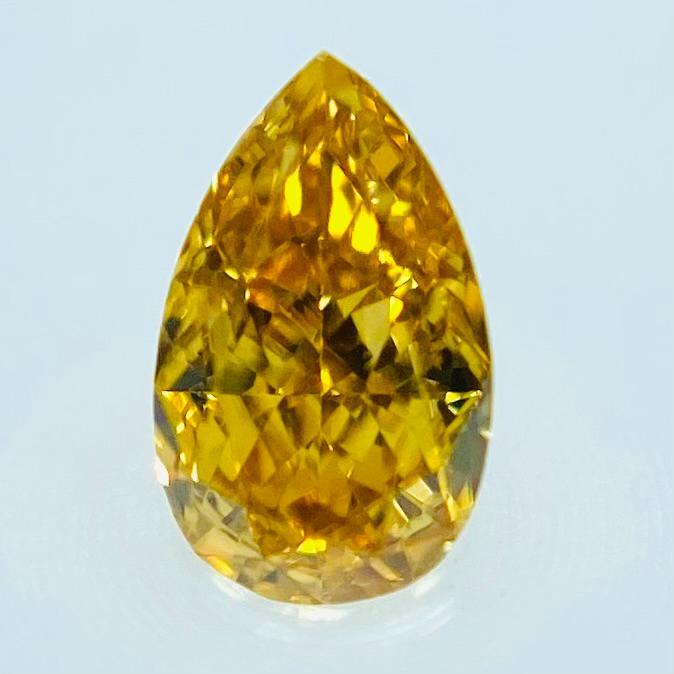 アクセサリー FANCY VIVID YELLOW ORANGE 0.118ct PS
