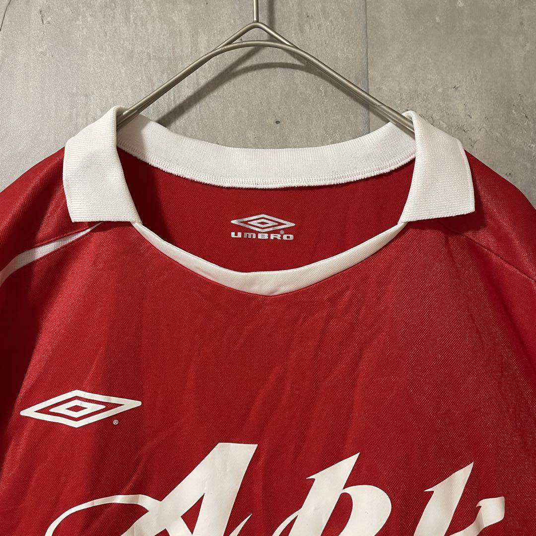 定番の中古商品 umbroアンブロフットボールteeサッカーシャツユニフォーム赤 ウェア