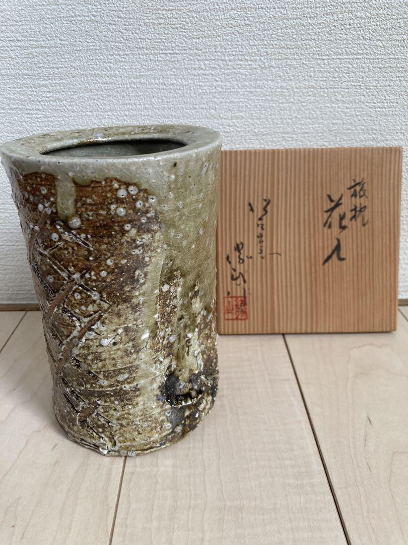 旅枕花入
