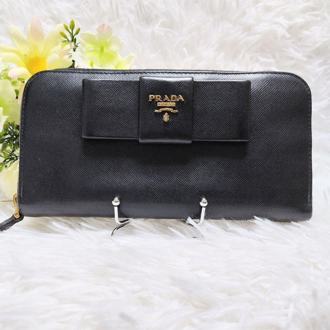 【お気にいる】 近年美品✨プラダ♡ラウンドファスナー長財布 ビッグリボン 小物