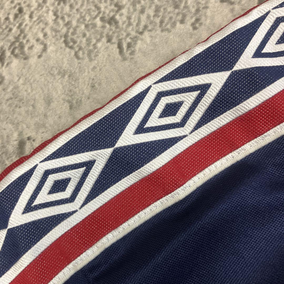 00s UMBRO アンブロ トレーニングシャツ 日本製 古着 テープロゴ 紺