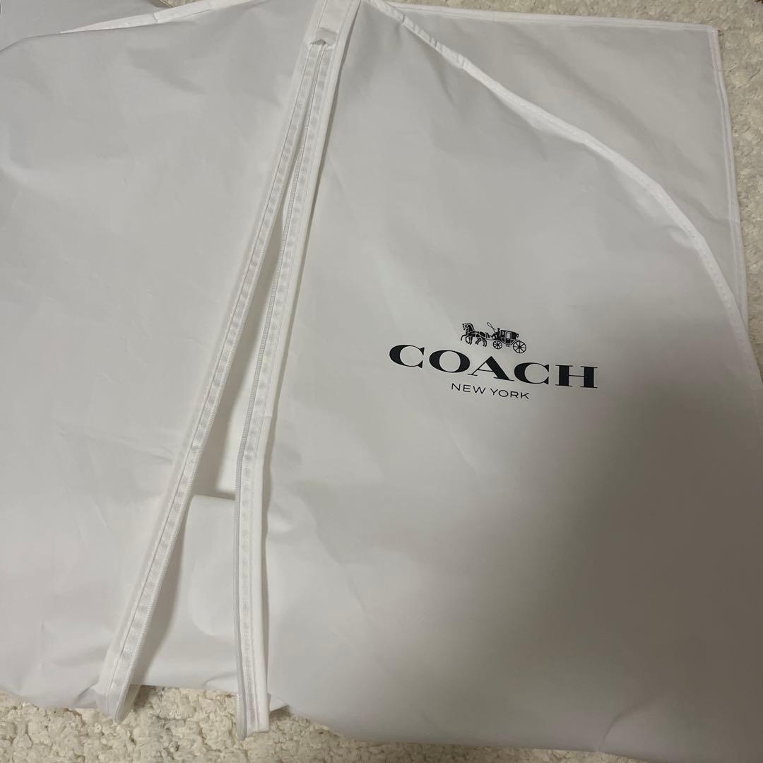 COACH 黒 ダウンジャケット 帽子取り外し可能 保管袋付き COACH 黒 ダウンジャケット 帽子取り外し可能 保管袋付き