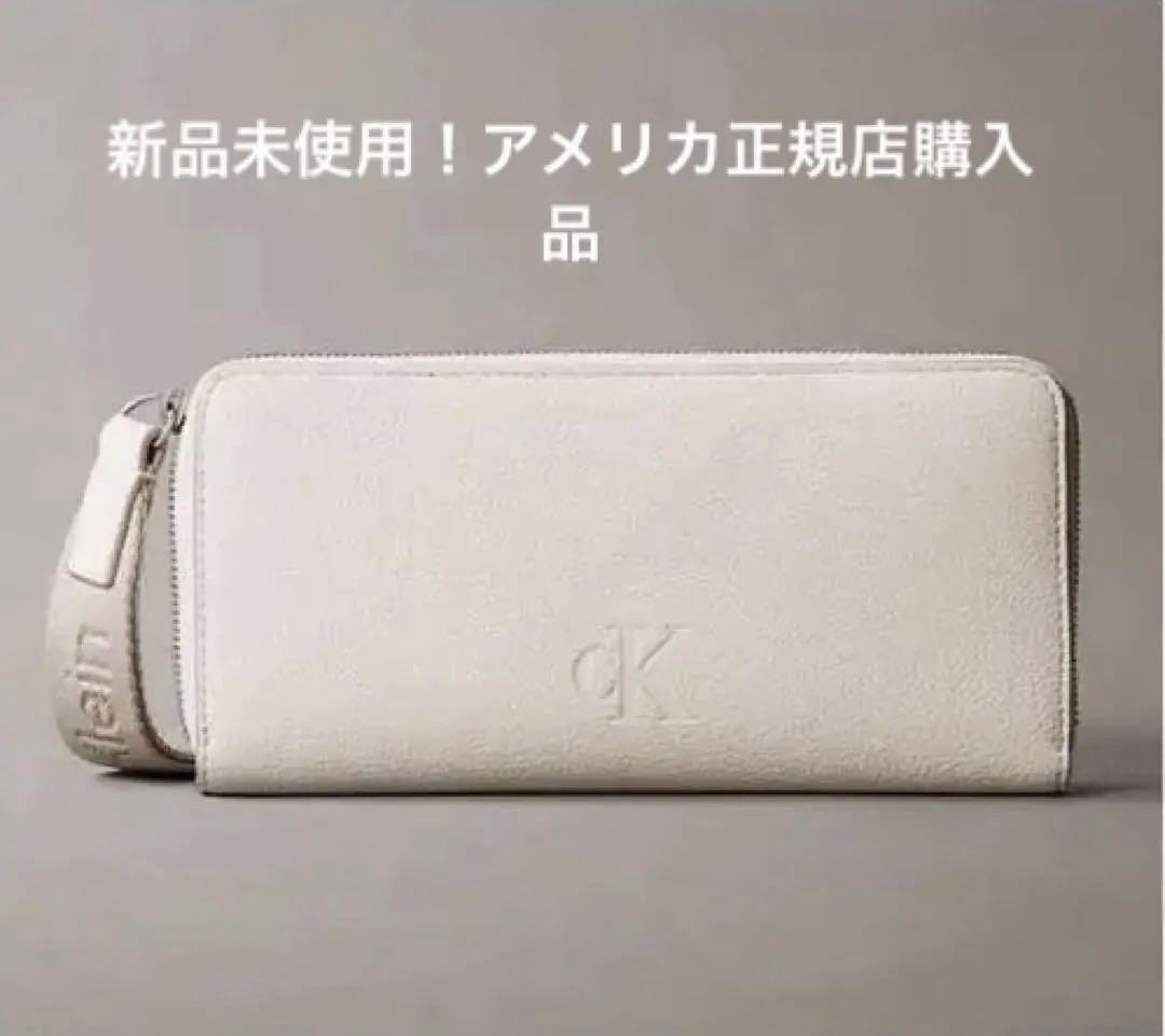 Calvin Klein ホワイト 長財布　エンボス加工ロゴ　ストラップ付き