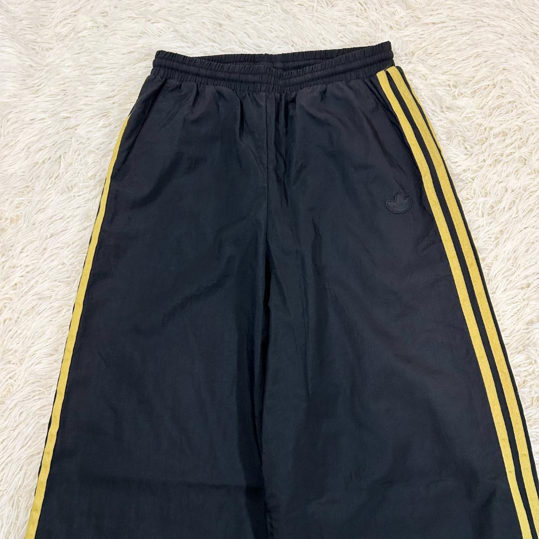 人気　adidas　アディダス　マリメッコ　ナイロンパンツ　コラボ　フレア　L