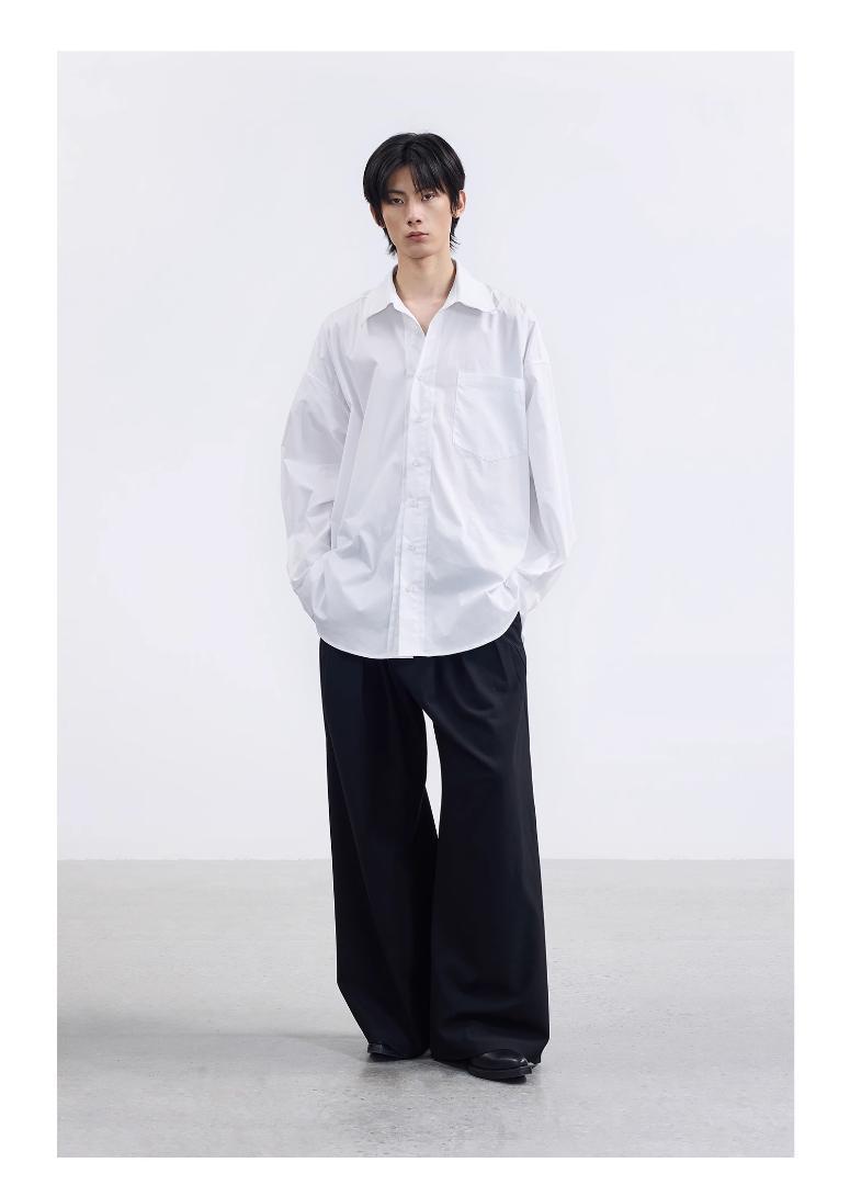 TERRAINCOGNITA シルエット構築的ローエッジ長袖シャツ 画像1