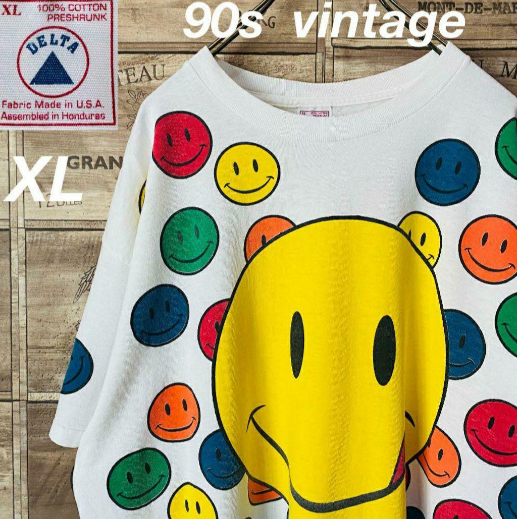 90s USA製 DELTAスマイリー総柄Tシャツ 13,800円