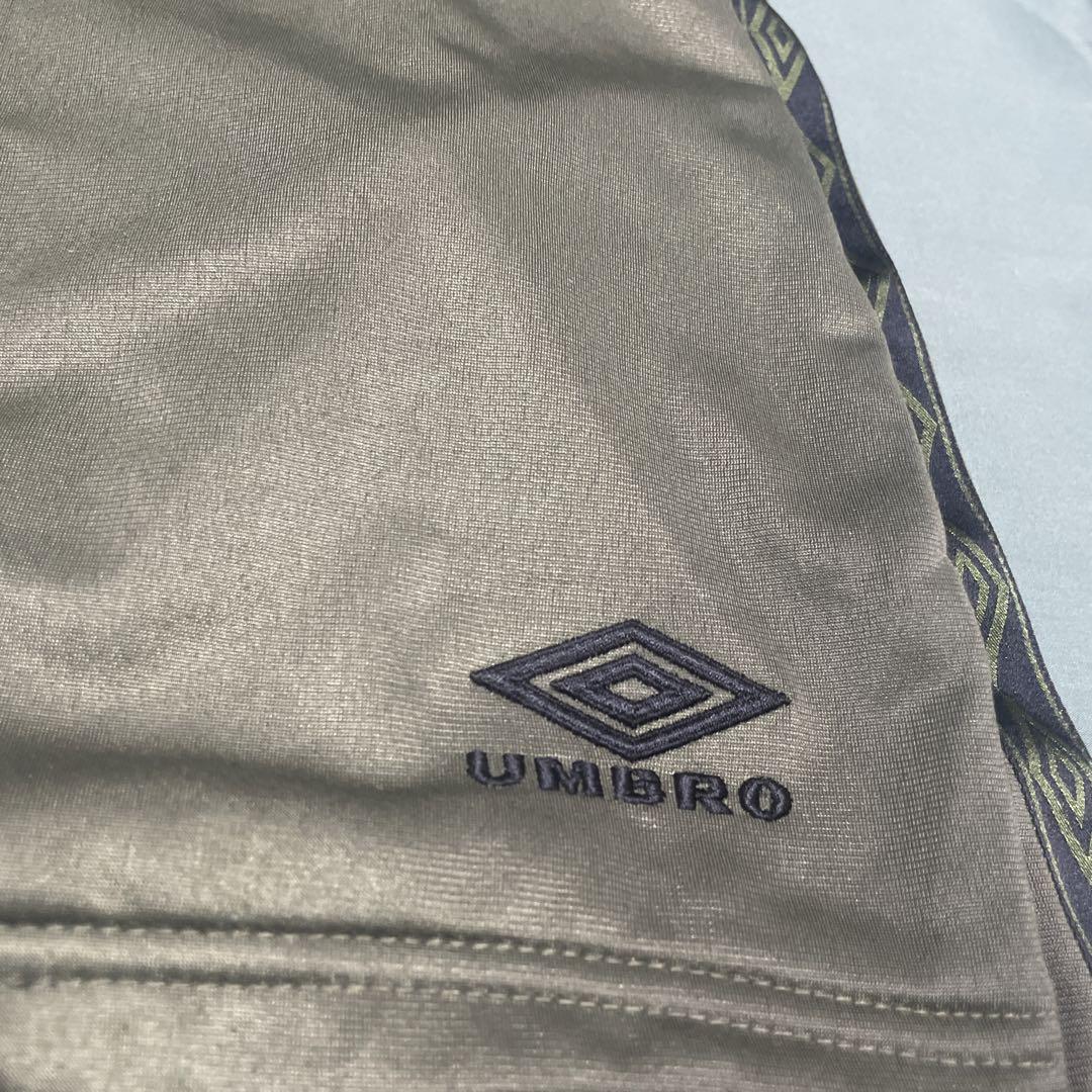 90年代UMBRO古着ベルベットトラックジャケットテープロゴカーキ/ W3 umbro × 9090 Tech Logo Track Jacket – YZ