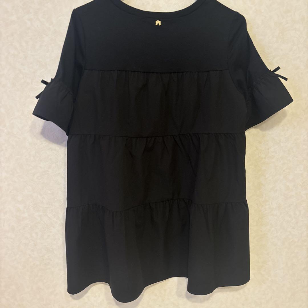 美品】黒いフリル袖チュニック 香水瓶 花柄プリント スーパー