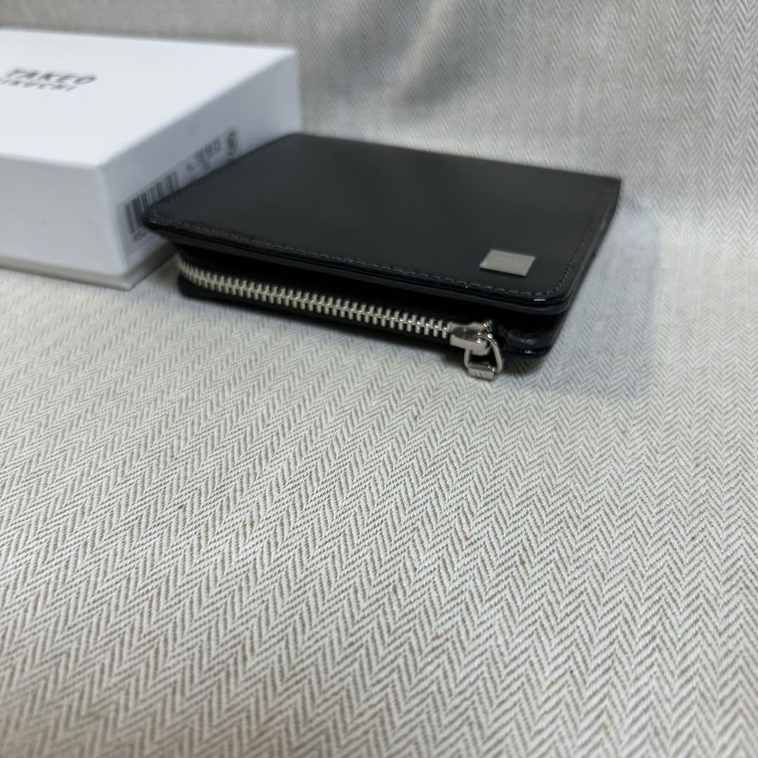 新品TAKEO KIKUCHI 黒レザー財布　薄くてコンパクト二つ折り