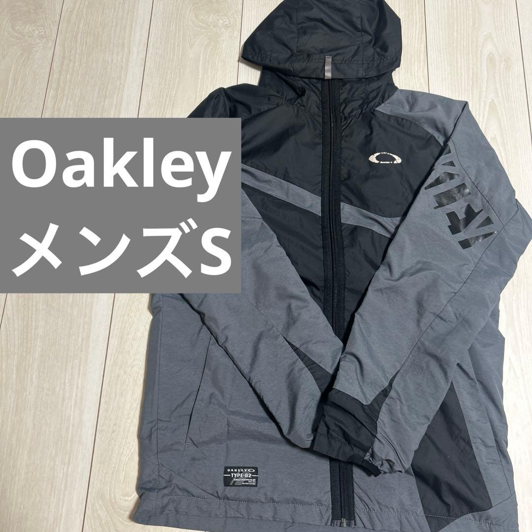 Oakley フード付きナイロンジャケット グレー/ブラック - メルカリ Oakley フード付きナイロンジャケット グレー/ブラック - メルカリ