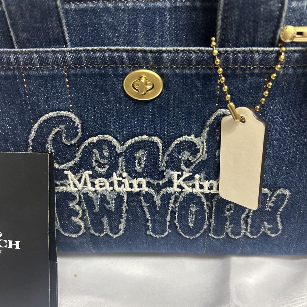 COACH カーゴトート26デニム マーティンキム - メルカリ