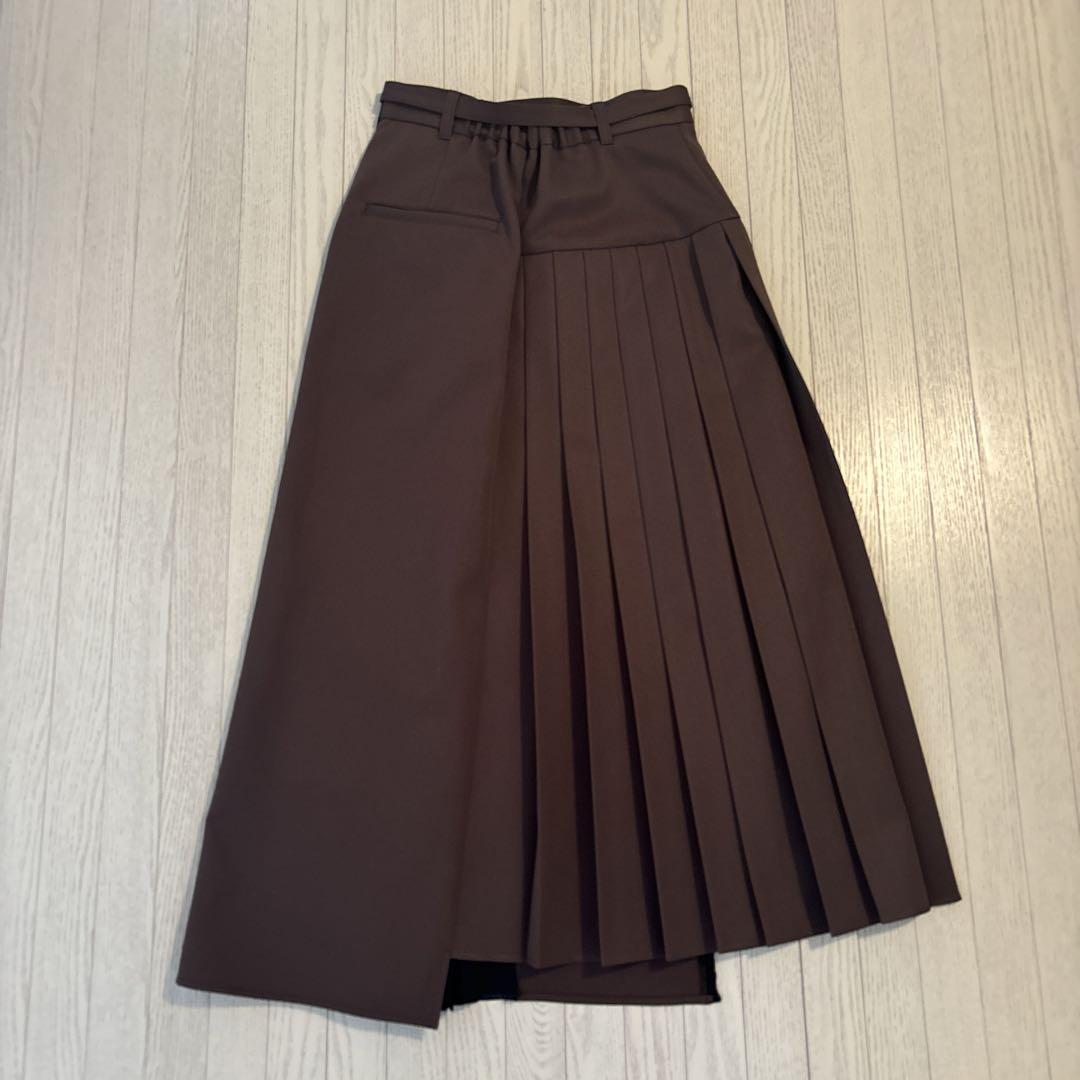 UNITED TOKYO オプティカルジッププリーツスカート