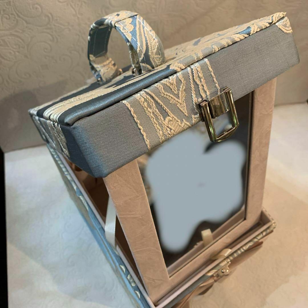 リボン付き青色と金色の小物入れ目立った傷や汚れなし