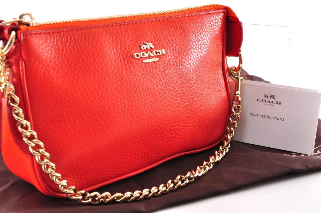 未使用 COACH コーチ チェーン アクセサリーポーチ オレンジ 保存袋付き