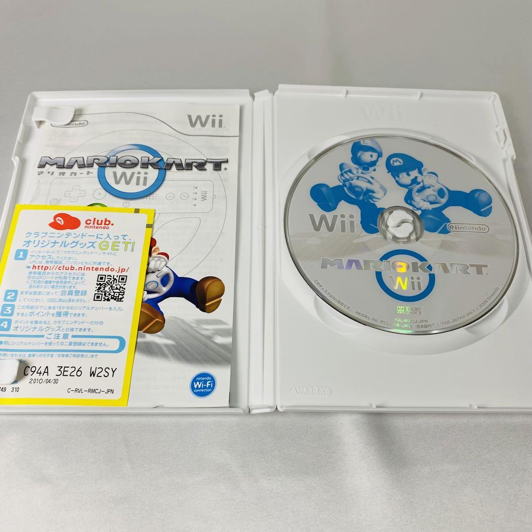 wii 本体　wiiリモコン2本　ヌンチャク2本　ハンドル2個　ソフト4本