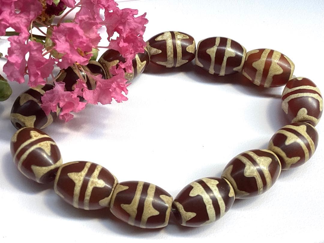 ✳四線虎牙天珠【黒鳶赤紋】　全て透過の何処にも無いブレスレット‼️サイズ直し無料‼️