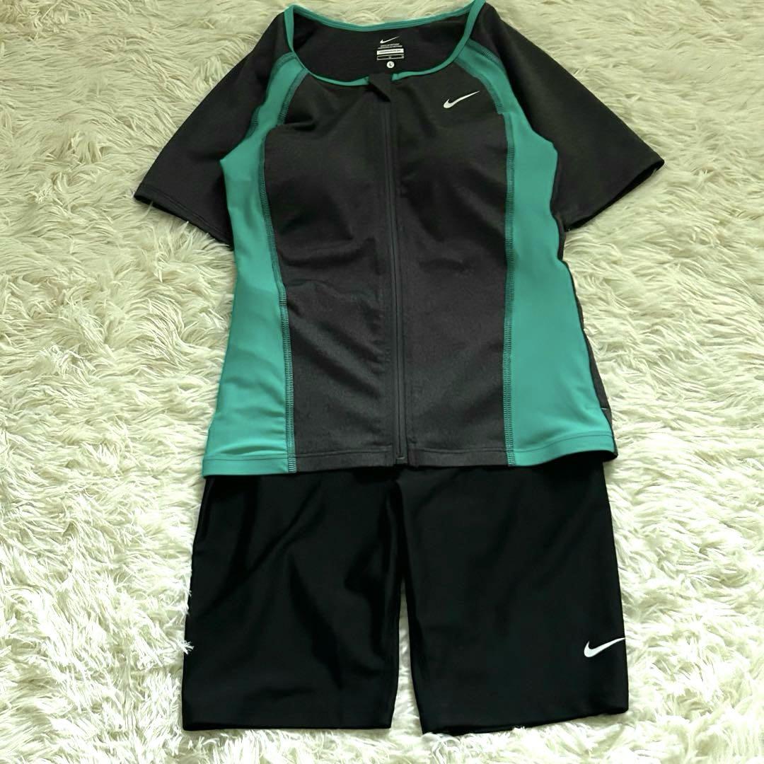 [美品]おまけ付き✨NIKEナイキ　スポーツ水着　半袖　上下セット　Lサイズ