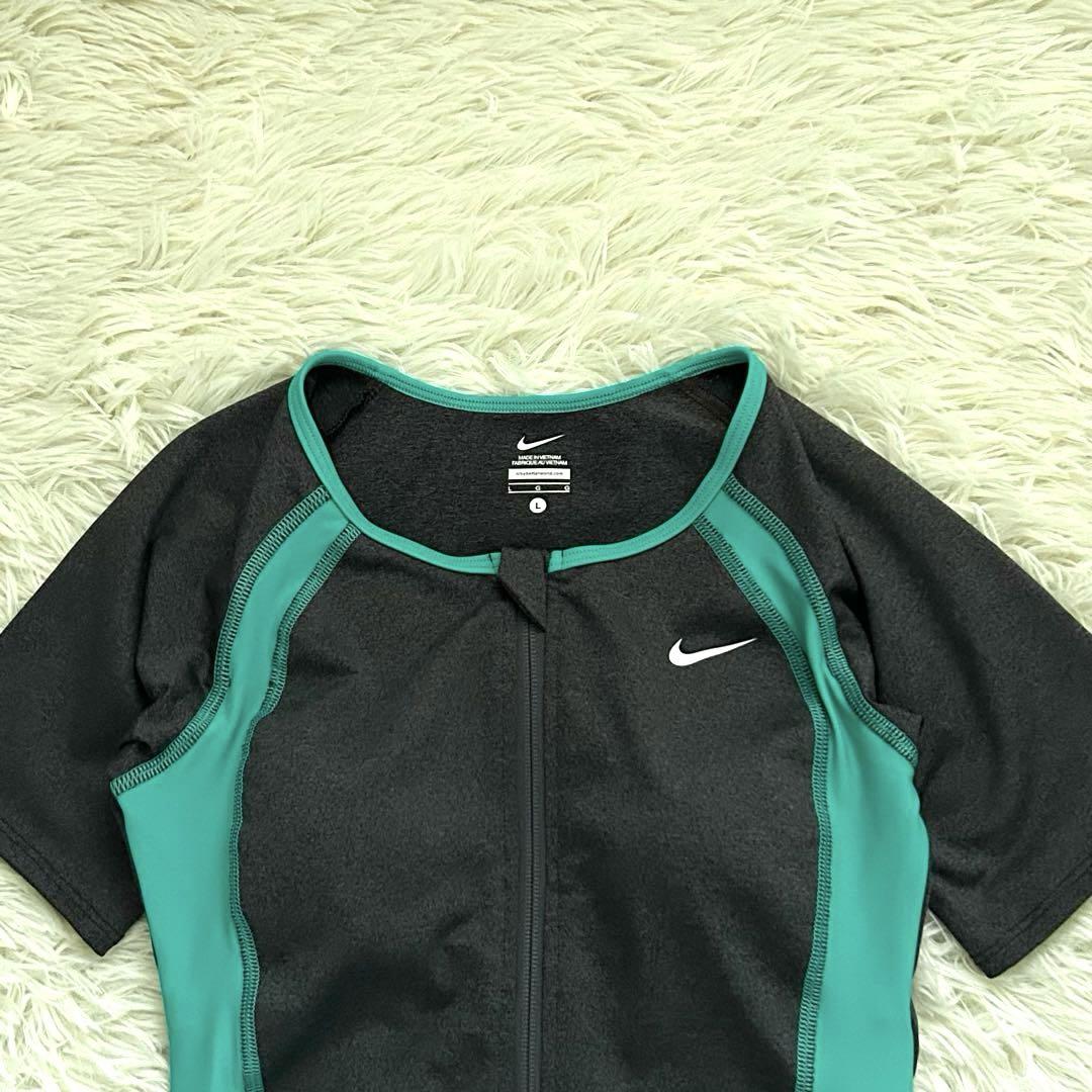 [美品]おまけ付き✨NIKEナイキ　スポーツ水着　半袖　上下セット　Lサイズ