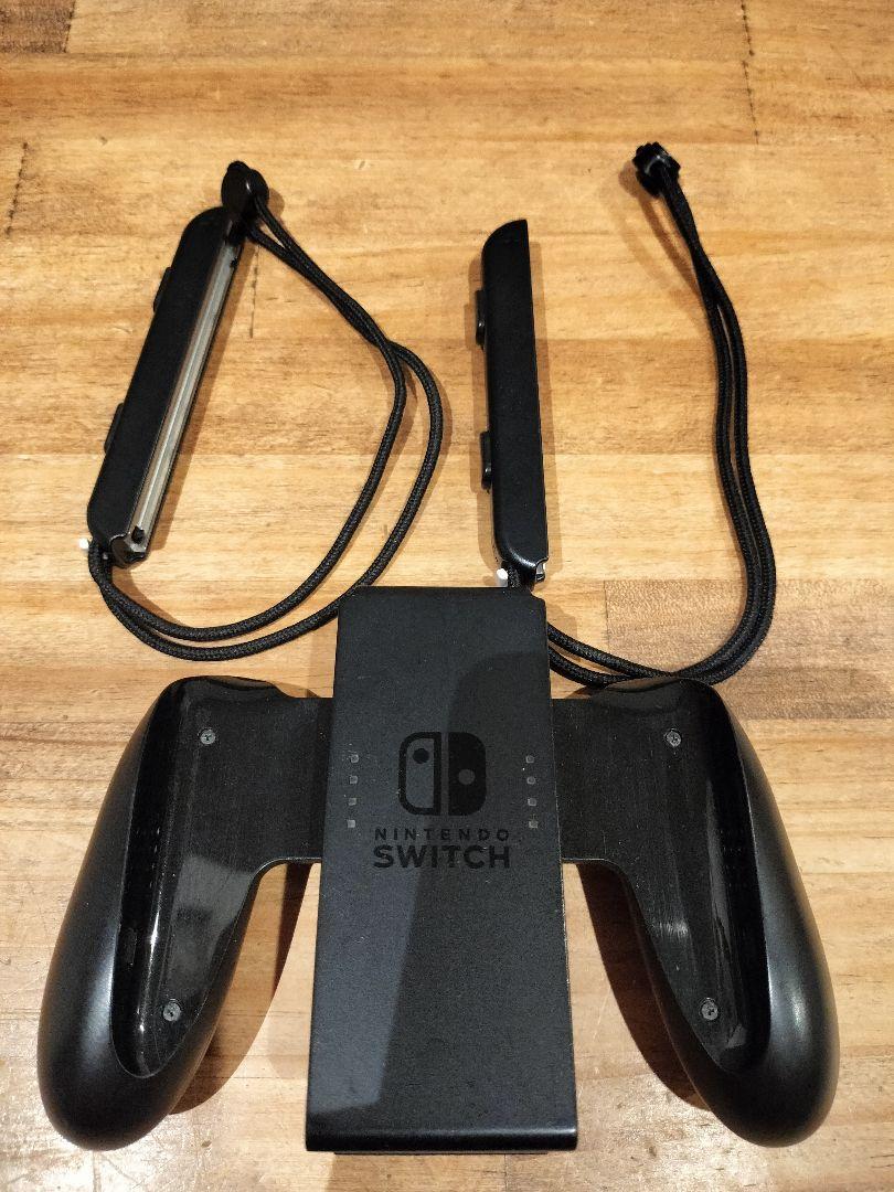 ニンテンドースイッチ　本体　初期化　動作確認済み　ジョイコン　ハンドル付き ニンテンドースイッチ 本体 初期化 動作確認済み ジョイコン