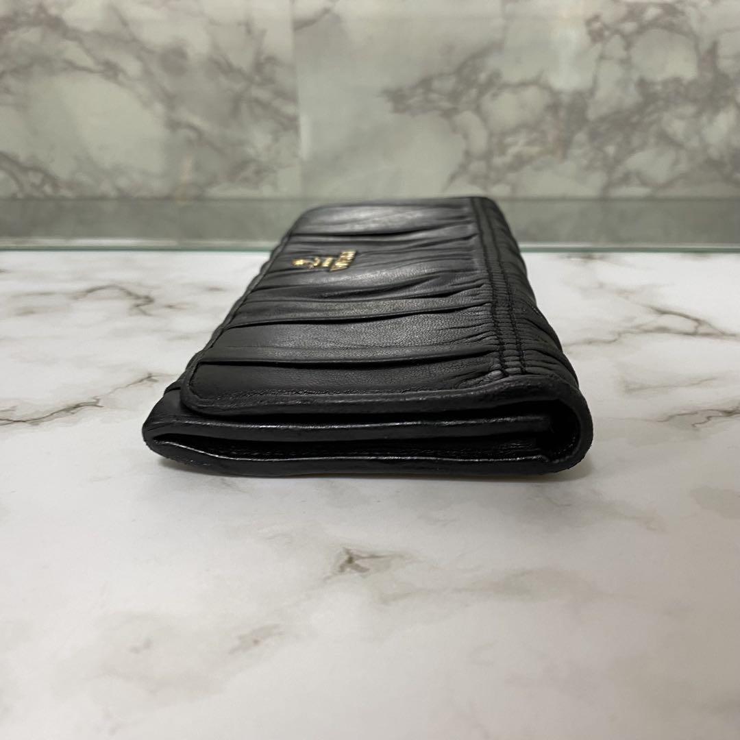 誠実 プラダ PRADA 長財布 ゴールド 黒 ギャザー レザー 本革 ブラック 小物