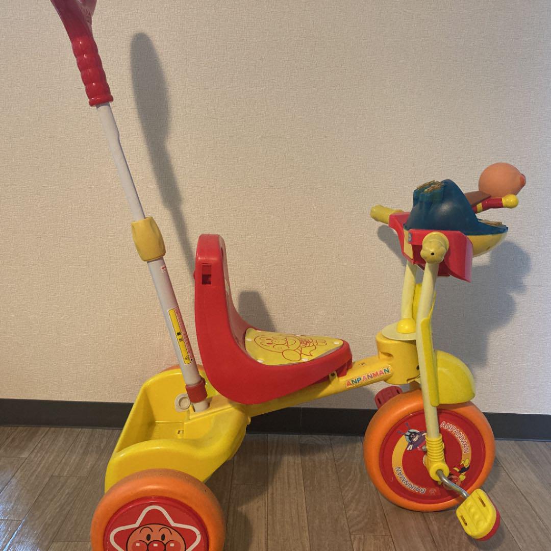 人気のファッションブランド! アンパンマン三輪車 補助棒付き - 三輪車/乗り物