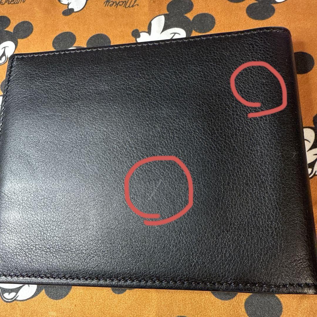 Cartier 二つ折り財布 外側ブラック　内側ブラウン　レザー製※証明書等なし